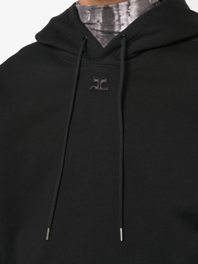 Shop Courrèges Logo Drawstring Hoodie In Black