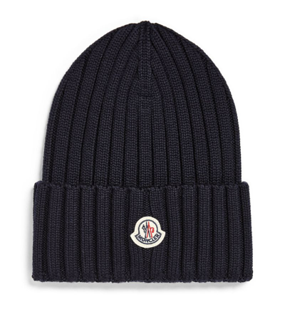 Shop Moncler Wool Ribbed Logo Beanie In Blue