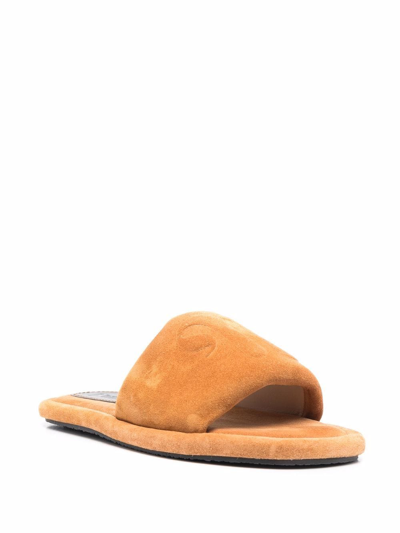 Shop Nanushka Logo-embossed Leather Sandals In Yellow