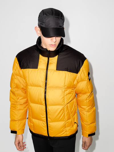 Shop The North Face Lhotse Down Jacket In Gold