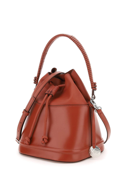Shop Staud Leather Agnes Bucket Bag In Red