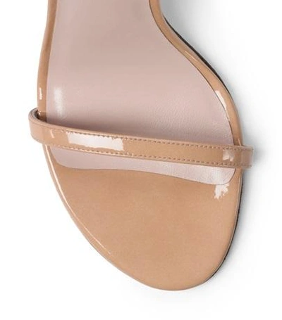 Shop Stuart Weitzman The Nunakedstraight Sandal In Adobe Beige Aniline Patent Leather