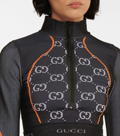 Shop Gucci Gg Cropped Jersey Top In Black/orange