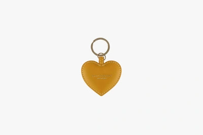 Shop Strathberry Heart Key Charm In Yellow