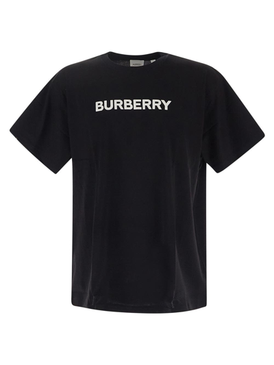 Shop Burberry Logo Printed T-shirt In Black