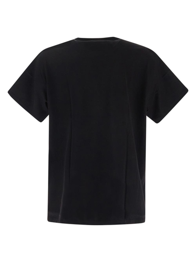 Shop Burberry Logo Printed T-shirt In Black