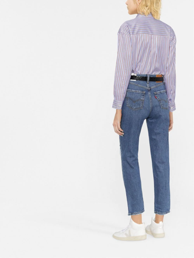 Shop Levi's Distressed-leg Detail Slim Jeans In Blau