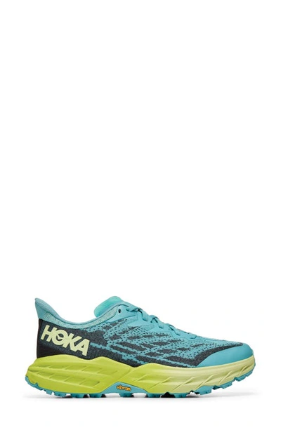 Shop Hoka Speedgoat 5 Running Shoe In Coastal Shade / Green Glow