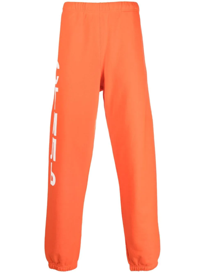 Shop Heron Preston Logo-print Track Pants In Orange