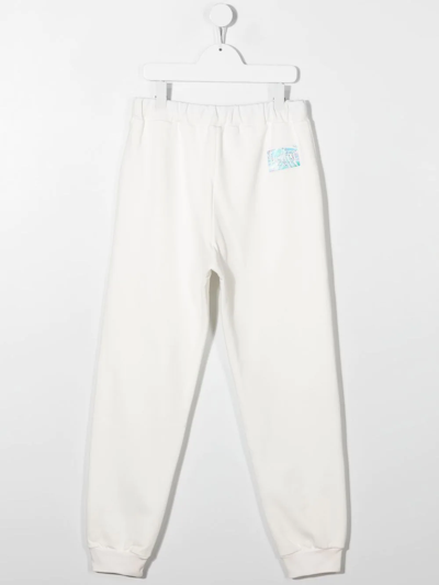 Shop Pucci Junior Logo-patch Cotton Track Pants In Neutrals