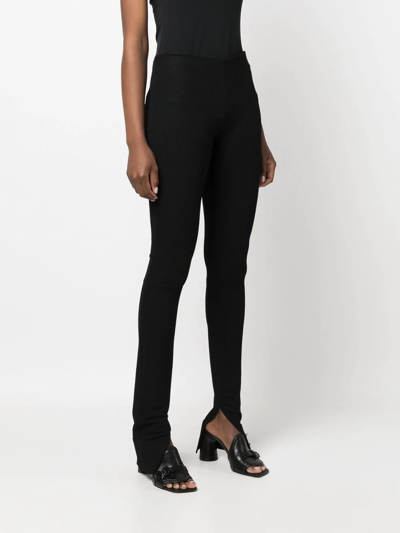 Shop Alyx Slim-fit Slit-hem Trousers In Black