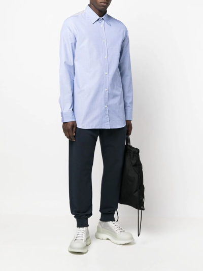 Alexander Mcqueen Motif-print Cotton Joggers In Blue