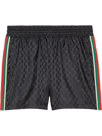 Shop Gucci Gg-jacquard Elasticated Swim Shorts In Black