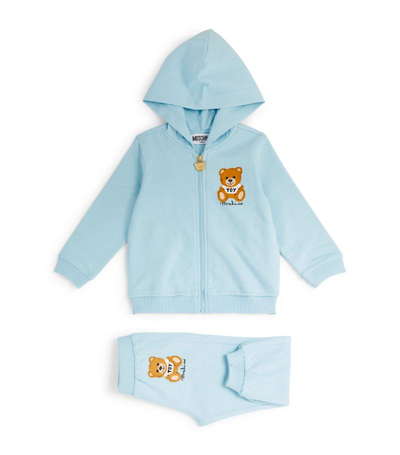 Shop Moschino Kids Teddy Bear Tracksuit (3-36 Months) In Blue