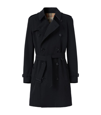 Shop Burberry Mid-length Kensington Heritage Trench Coat In Black