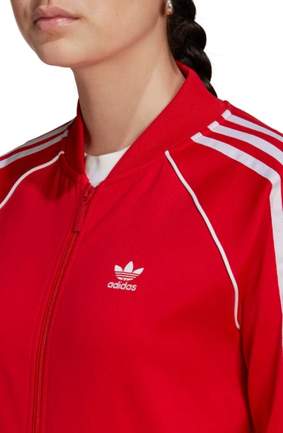 Shop Adidas Originals Primeblue Sst Track Jacket In Vivid Red
