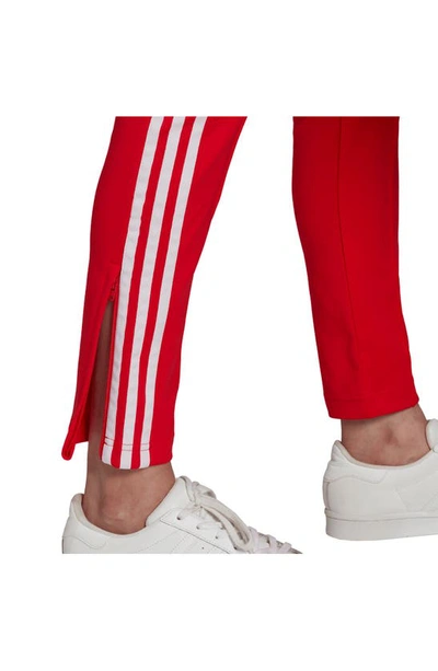 Shop Adidas Originals Primeblue Superstar Track Pants In Vivid Red