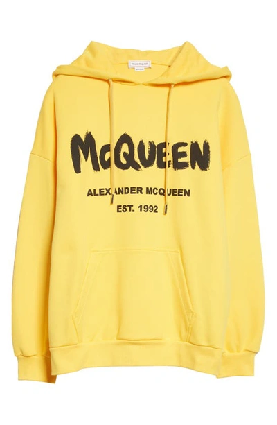 Shop Alexander Mcqueen Graffiti Logo Cotton Hoodie In Pop Yellow / Black