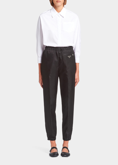 Shop Prada Classic Zip-cuff Re-nylon Trousers In F0002 Nero