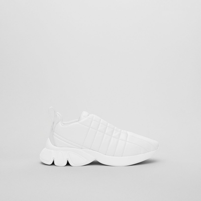 Shop Burberry Quilted Leather Classic Sneakers In Neutral White