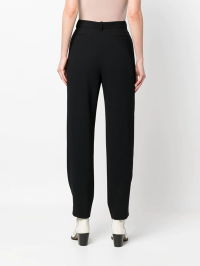 Shop Iro High-waist Tapered Trousers In Schwarz