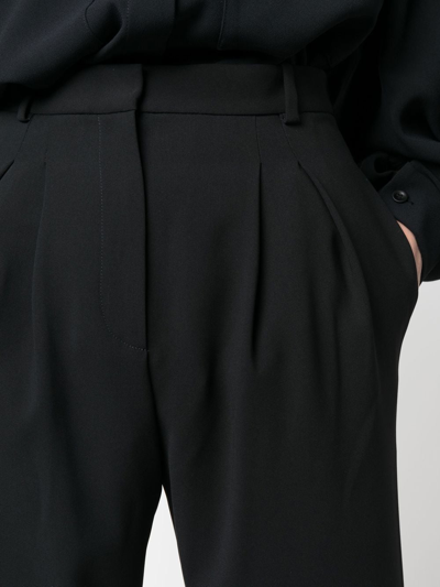 Shop Iro High-waist Tapered Trousers In Schwarz