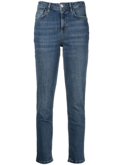 Shop Liu •jo Logo-patch Mid-rise Skinny Jeans In Blau