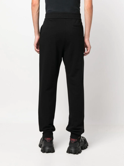 Versace Logo-print Track Pants In Schwarz