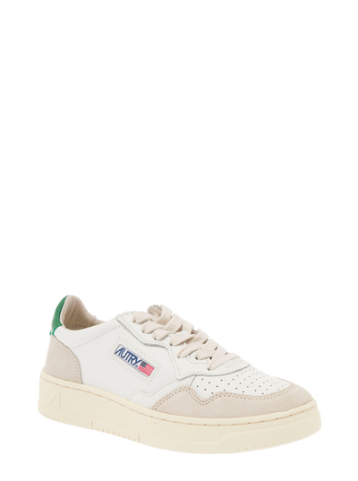 Shop Autry Low-top White And Green Sneakers In Leather And Suede  Woman
