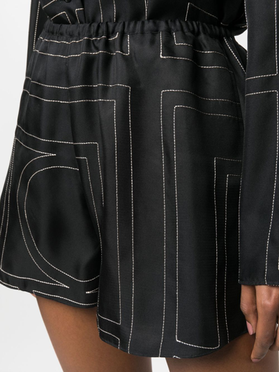 Totême Black Shorts With Geometric Logo Print In Silk Woman In Black