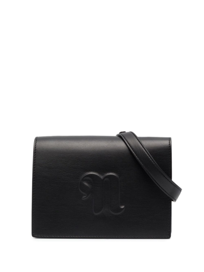 Shop Nanushka Embossed-logo Shoulder Bag In Black