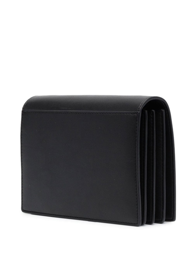 Shop Nanushka Embossed-logo Shoulder Bag In Black
