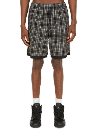 Shop Acne Studios Logo Embroidered Checked Shorts In Multi