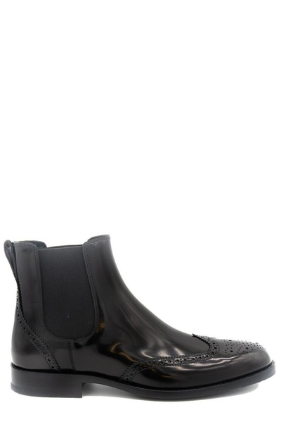 Shop Tod's Monogram Ankle Boots In Black