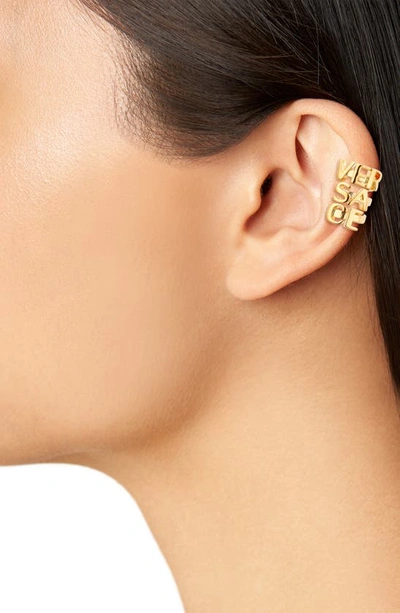 Shop Versace Logo Ear Cuff In  Gold
