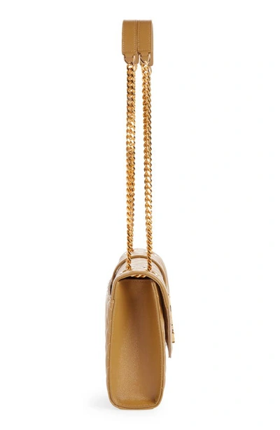 Shop Saint Laurent Medium Cassandra Calfskin Shoulder Bag In 3331 Golden