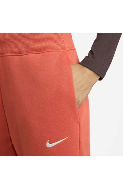 Shop Nike Sportswear Phoenix High Waist Wide Leg Sweatpants In Mantra Orange/sail