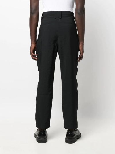 Shop Nanushka Pleat-detail Straight-leg Trousers In Black