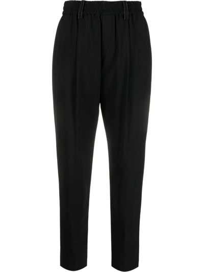 Shop Brunello Cucinelli High-waisted Tapered Trousers In Black