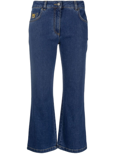Shop Moschino Teddy Bear-appliqué Kick Flare Jeans In Blue