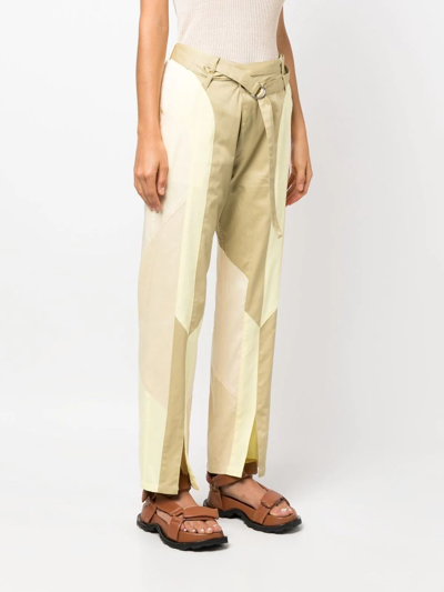 Shop Kiko Kostadinov Panelled Buckled-waist Trousers In Yellow