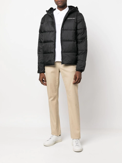 Shop Calvin Klein Jeans Est.1978 Padded Drawstring Hood Jacket In Black