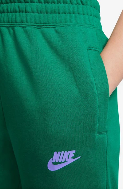 Shop Nike Kids' Culture Of Basketball Joggers In Malachite/ Light Thistle
