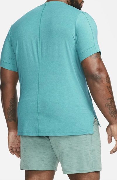 Shop Nike Dri-fit Yoga T-shirt In Geode Teal/ Roma Green/ Black