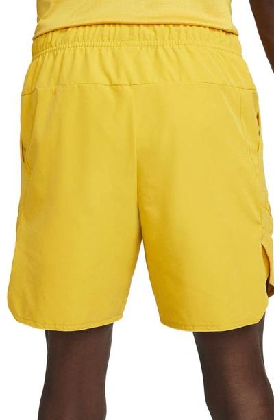 Shop Nike Court Dri-fit Advantage 7" Tennis Shorts In Yellow Ochre/ Black/ White
