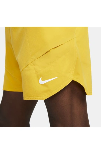 Shop Nike Court Dri-fit Advantage 7" Tennis Shorts In Yellow Ochre/ Black/ White