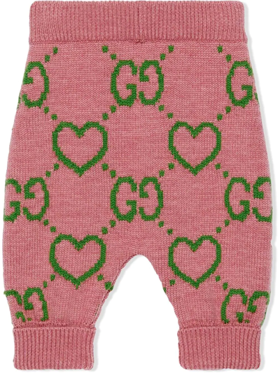 Shop Gucci Intarsia-knit Logo Slip-on Trousers In Pink