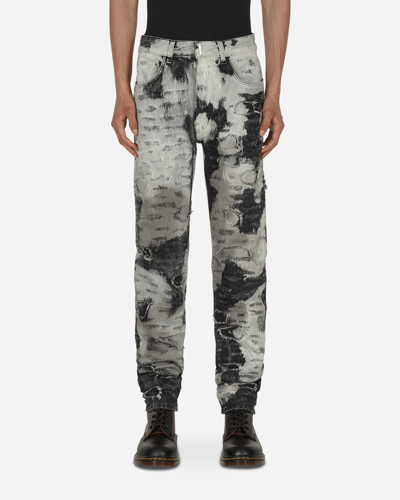 Shop Givenchy Painted Destroyed Jeans In White
