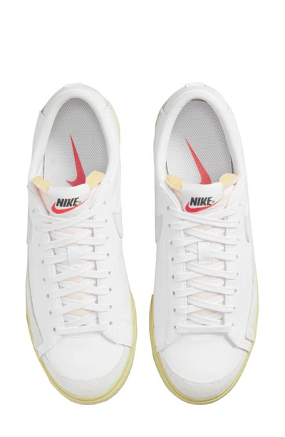 Shop Nike Blazer Low Platform Sneaker In White/ White-lemon Wash-black