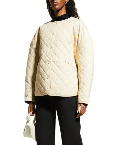 Shop Totême Quilted Oversize Canvas Jacket In Light Hay